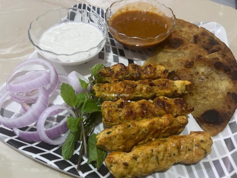 Chicken Seekh Paratha With Red Chutney And Raita